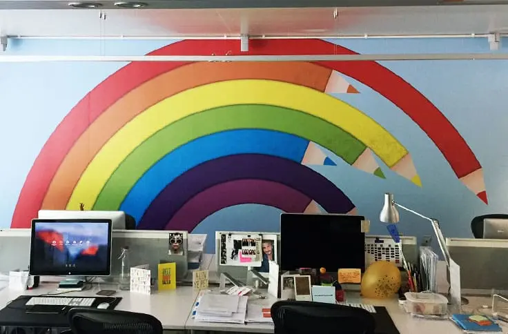 a photo of bespoke printed wall vinyl installed a in school office.