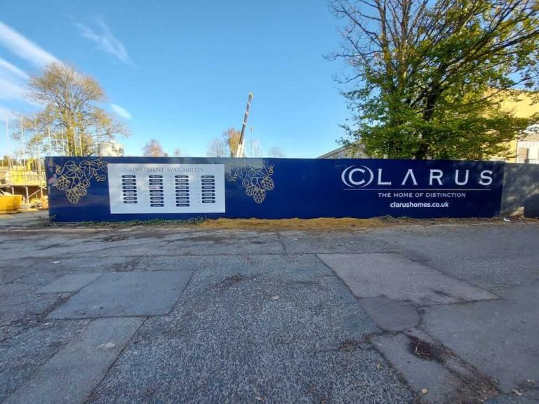 A photo of printed site hoarding panels for Clarus homes