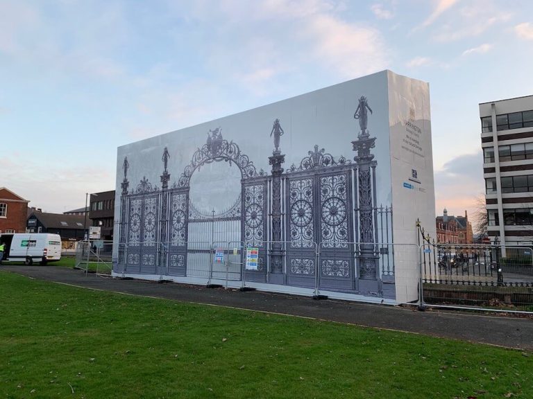 A photo of printed hoarding panels with Golden Gates