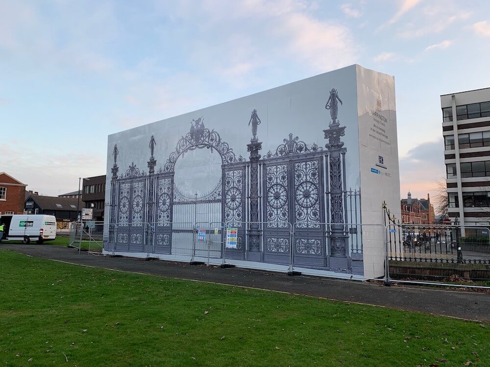 A photo of printed hoarding panels with Golden Gates